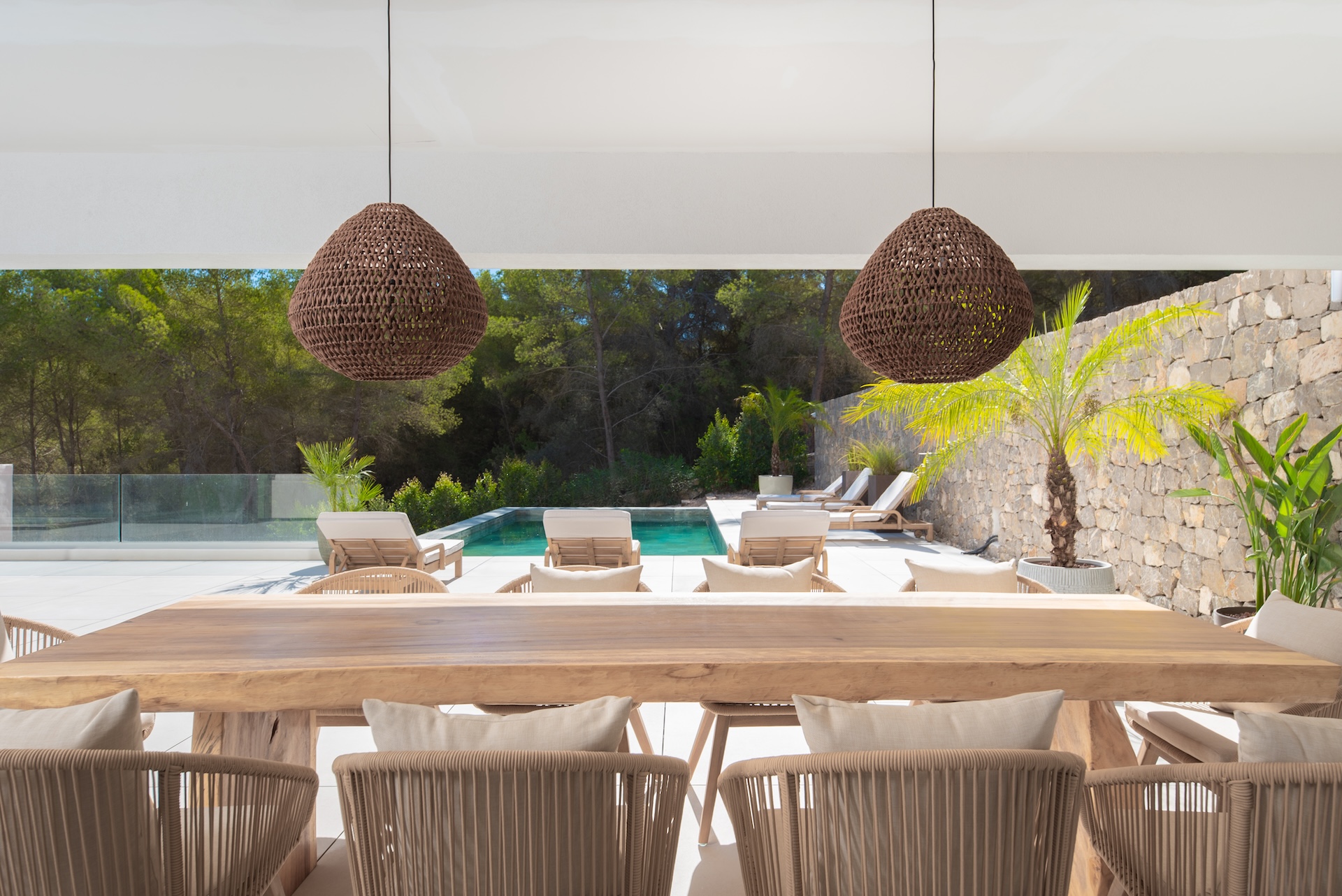 Resa Estates Ibiza villa te koop modern 1.terrace covered dining pool.jpg